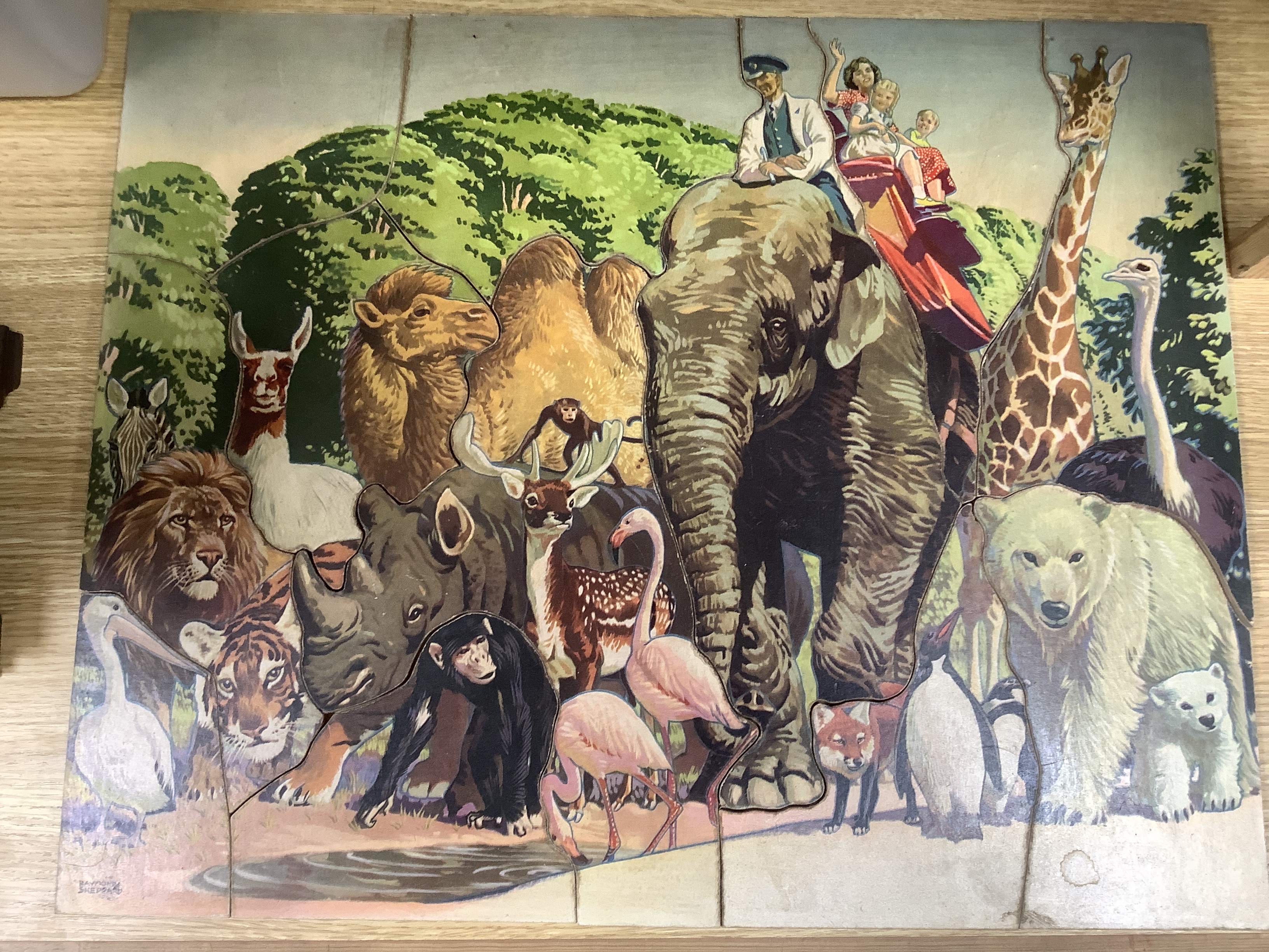 A quantity of various jigsaw puzzles including an animalistic example by Raymond Sheppard